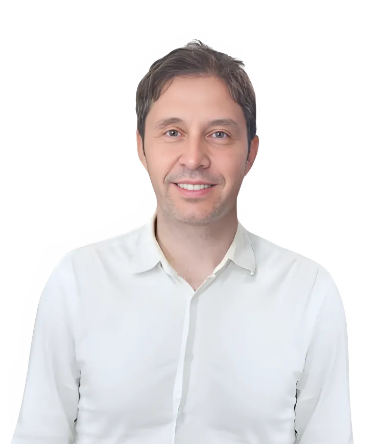 Op. Dr. Hasan Hüseyin Arslan, renowned ENT specialist and rhinoplasty expert, wearing a white coat.