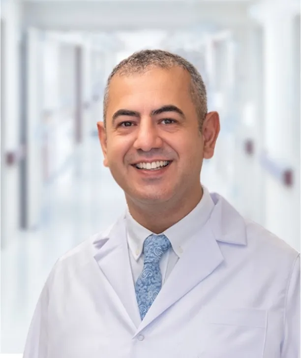 Dr. Sinan